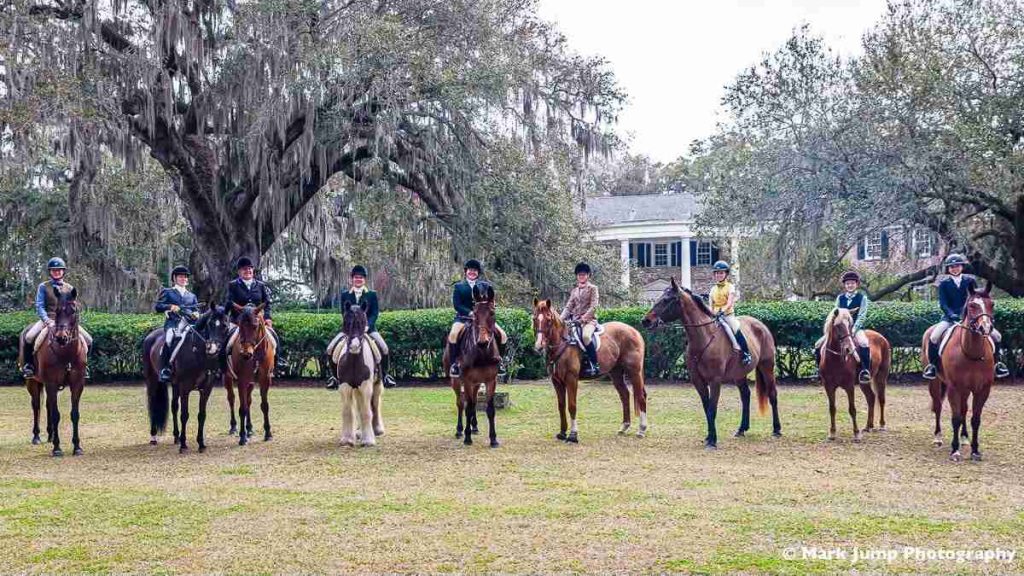 Line of mounted hunt riders